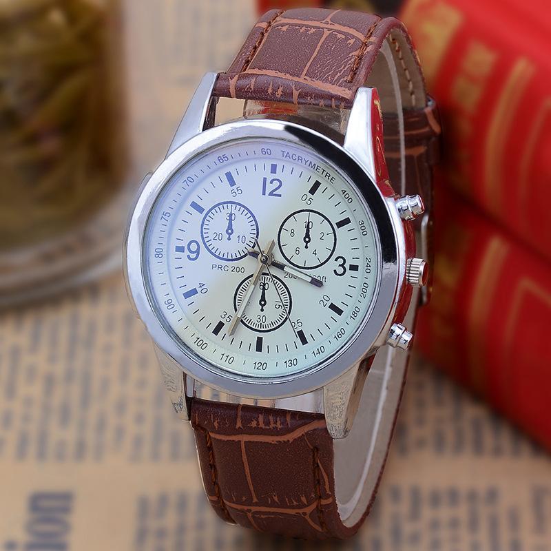 three eye brown band watch